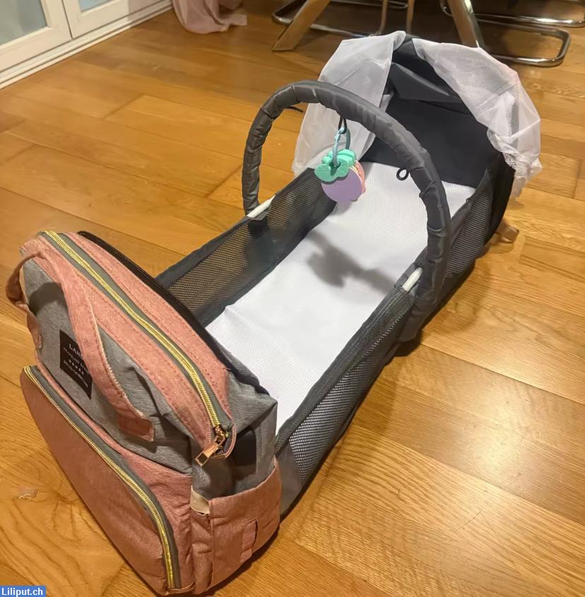 Bild 1: "Mami-Rucksack" inkl. Wickel und Liegefläche für Kind