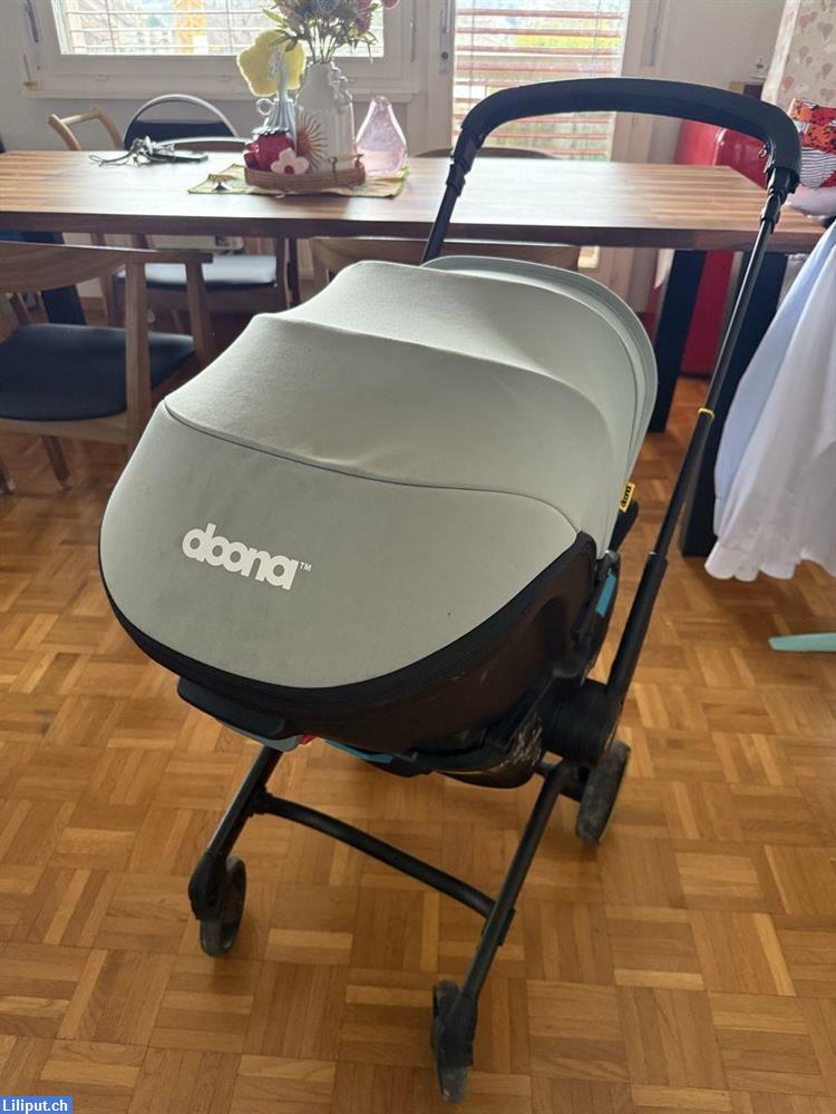 Bild 2: Doona X in Dusty Sage als Kinderwagen als auch als Autositz